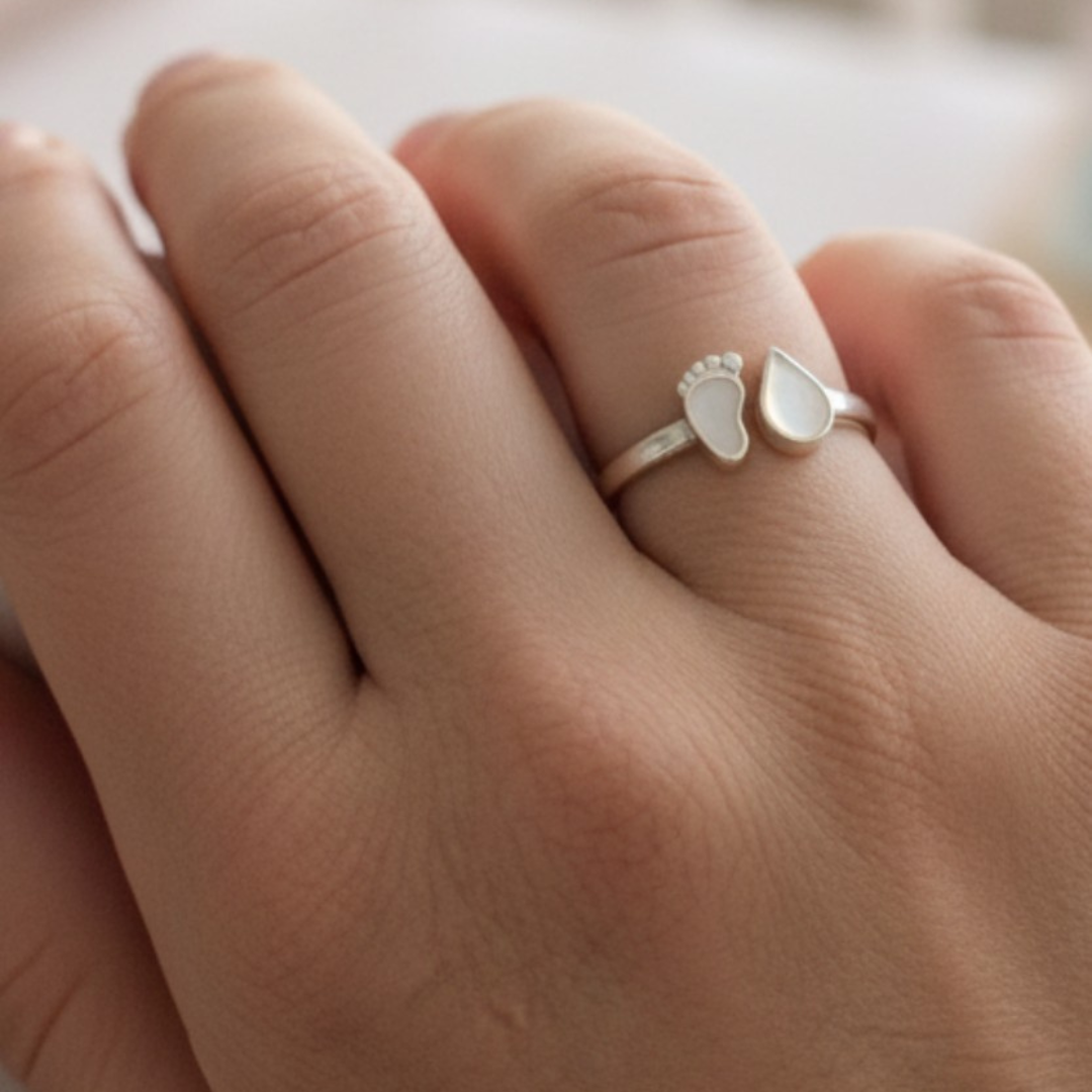Anillo pie y corazón de leche materna