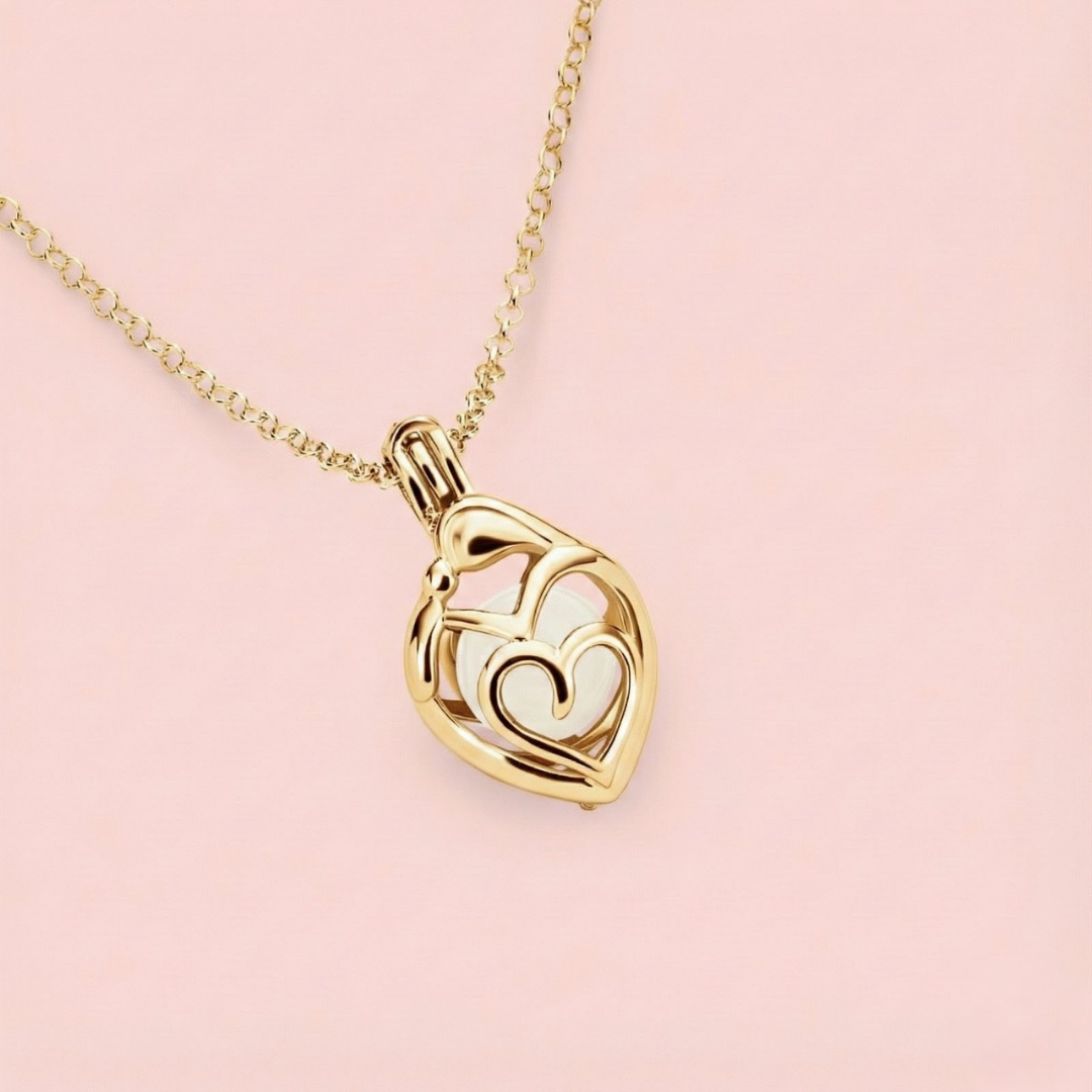 Colgante guarda-tesoro mamá y bebé con perla de leche materna en ORO 18K