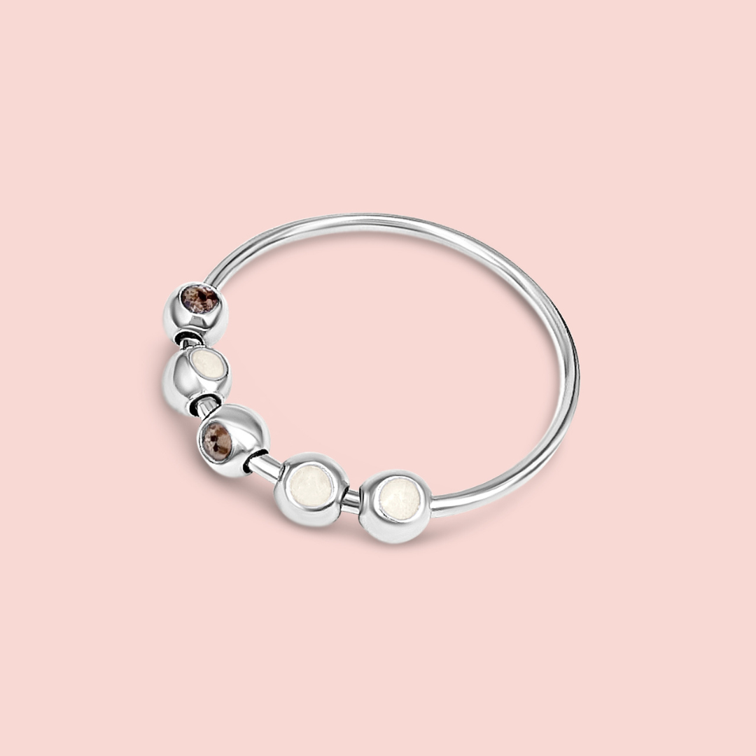 Anillo bolas giratorias de leche materna