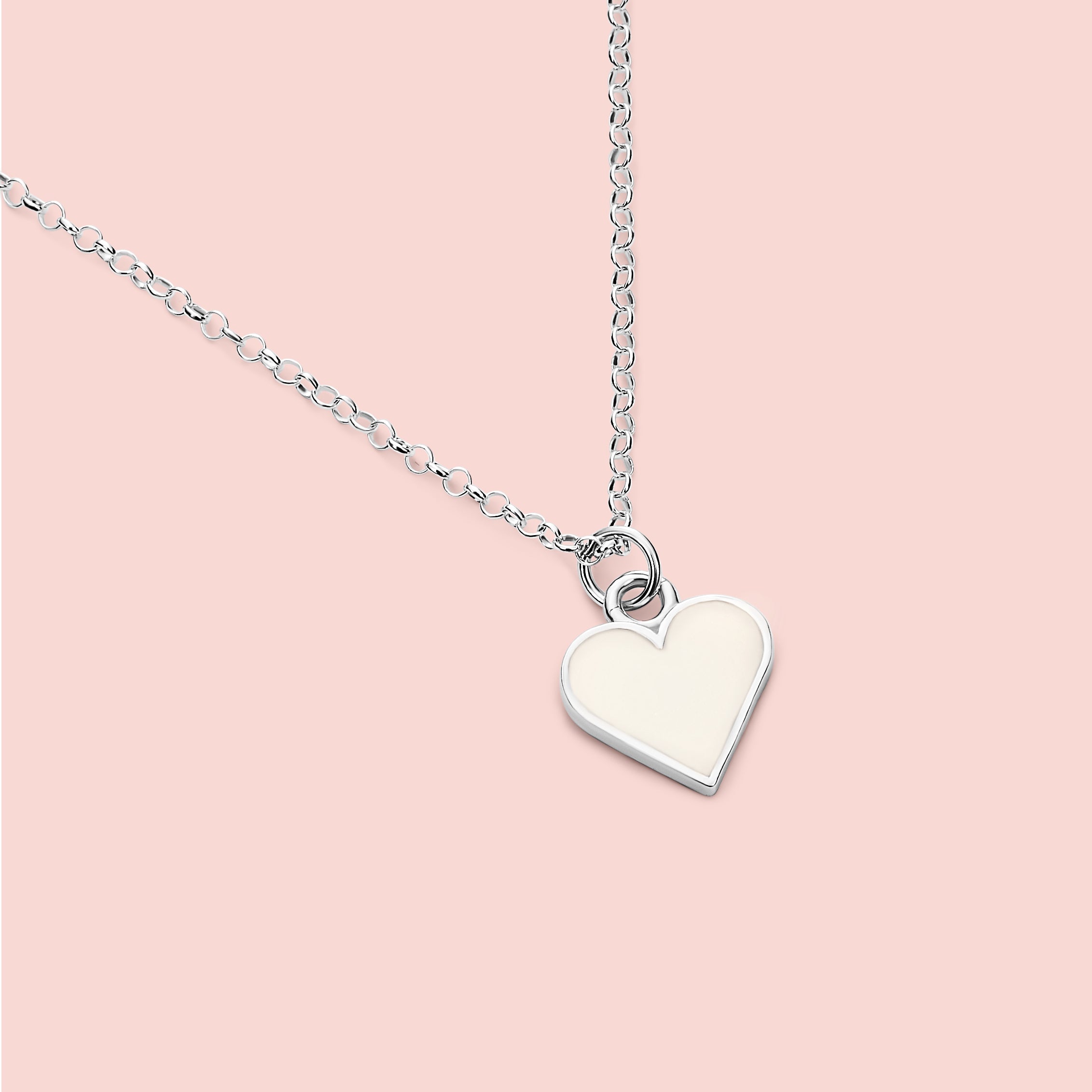 Colgante mini corazón de leche materna