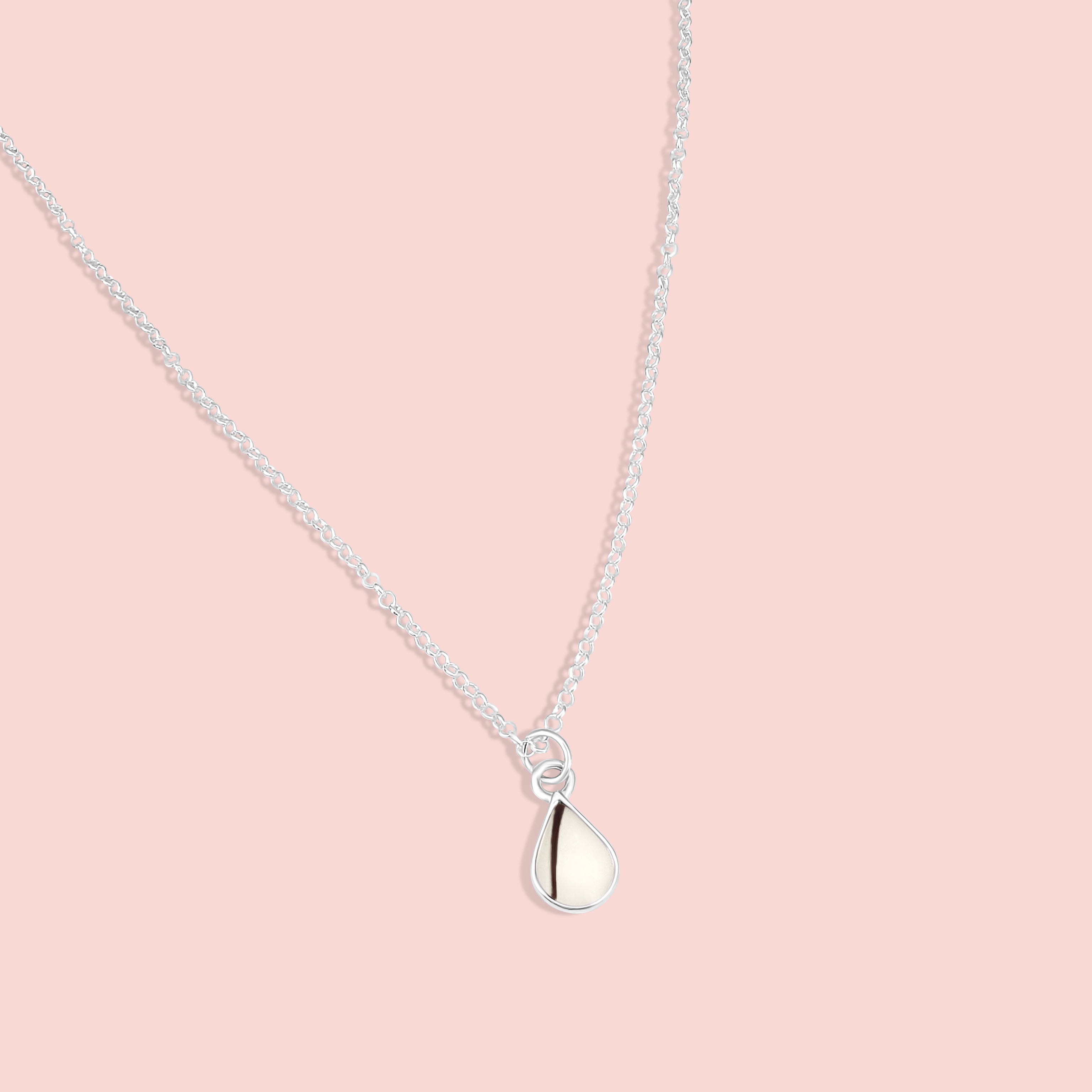 Colgante con forma de mini gota con leche materna y pelo en plata de ley, joya maternal personalizada