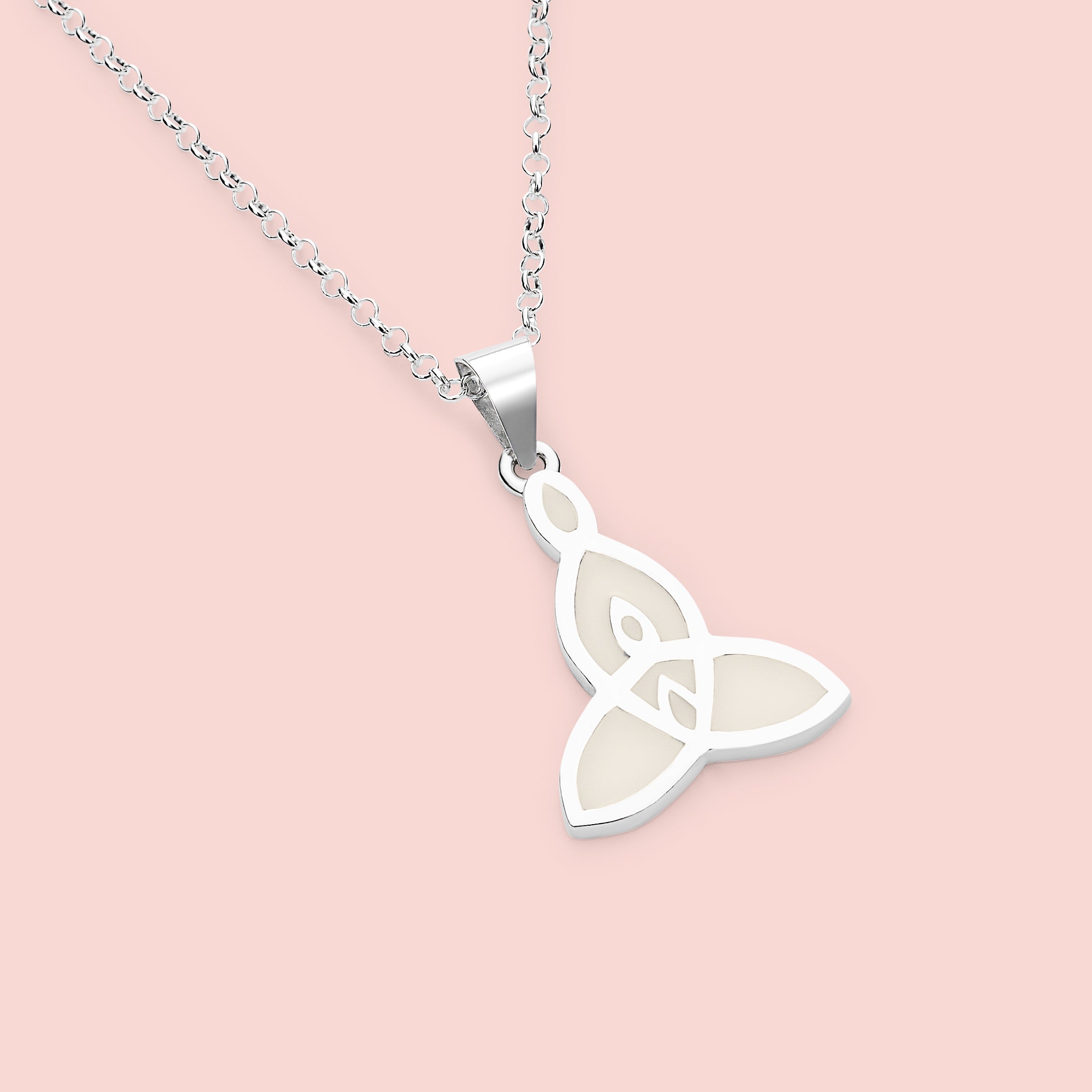 Colgante con forma de símbolo celta representando dos hijos en su interior de leche materna en plata de ley, joya maternal personalizada hecha a mano