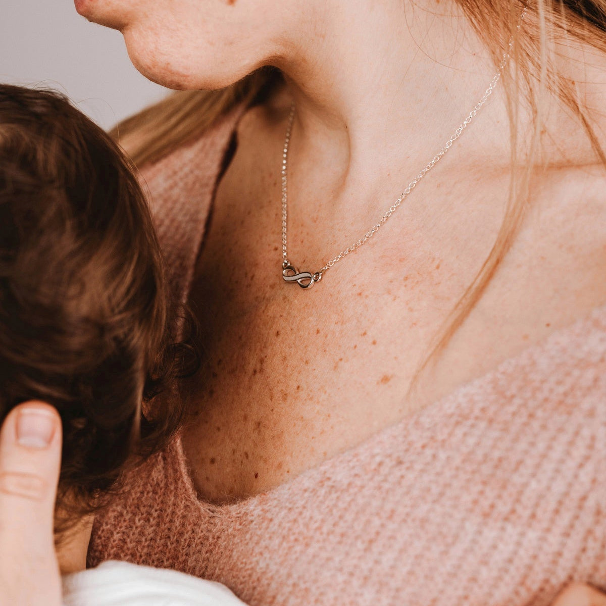 Colgante infinito de leche materna