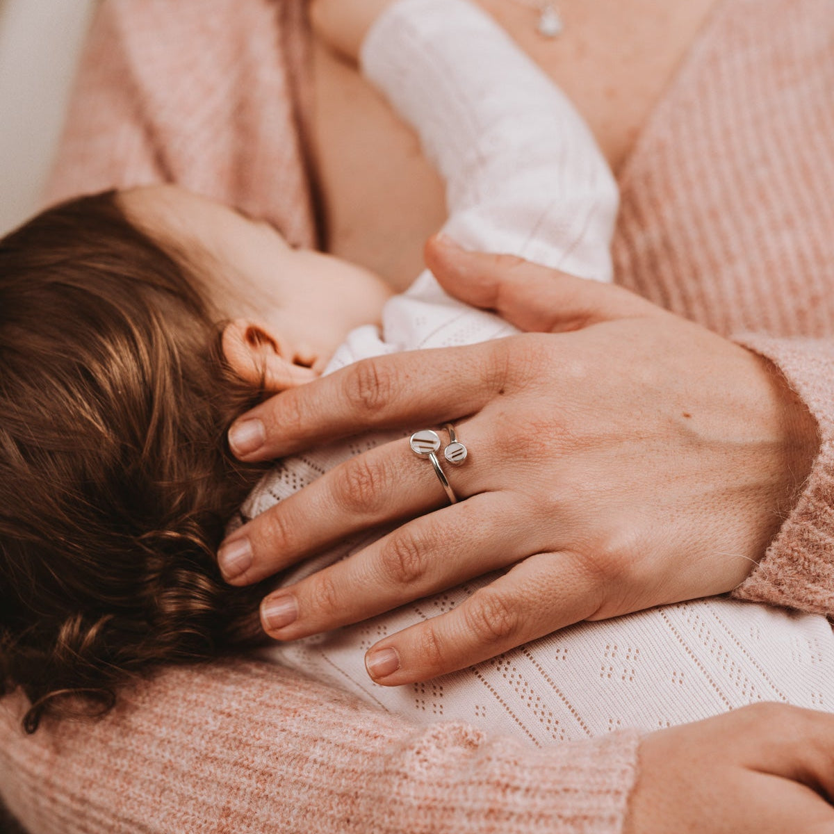 Anillo doble círculo de leche materna