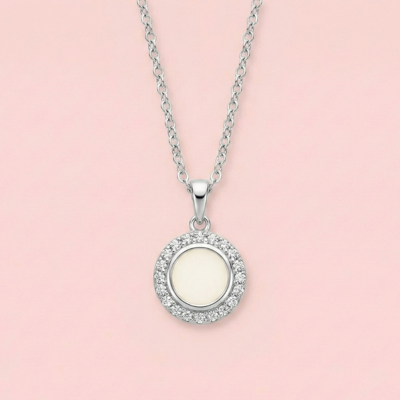 Colgante círculo con circonitas de leche materna