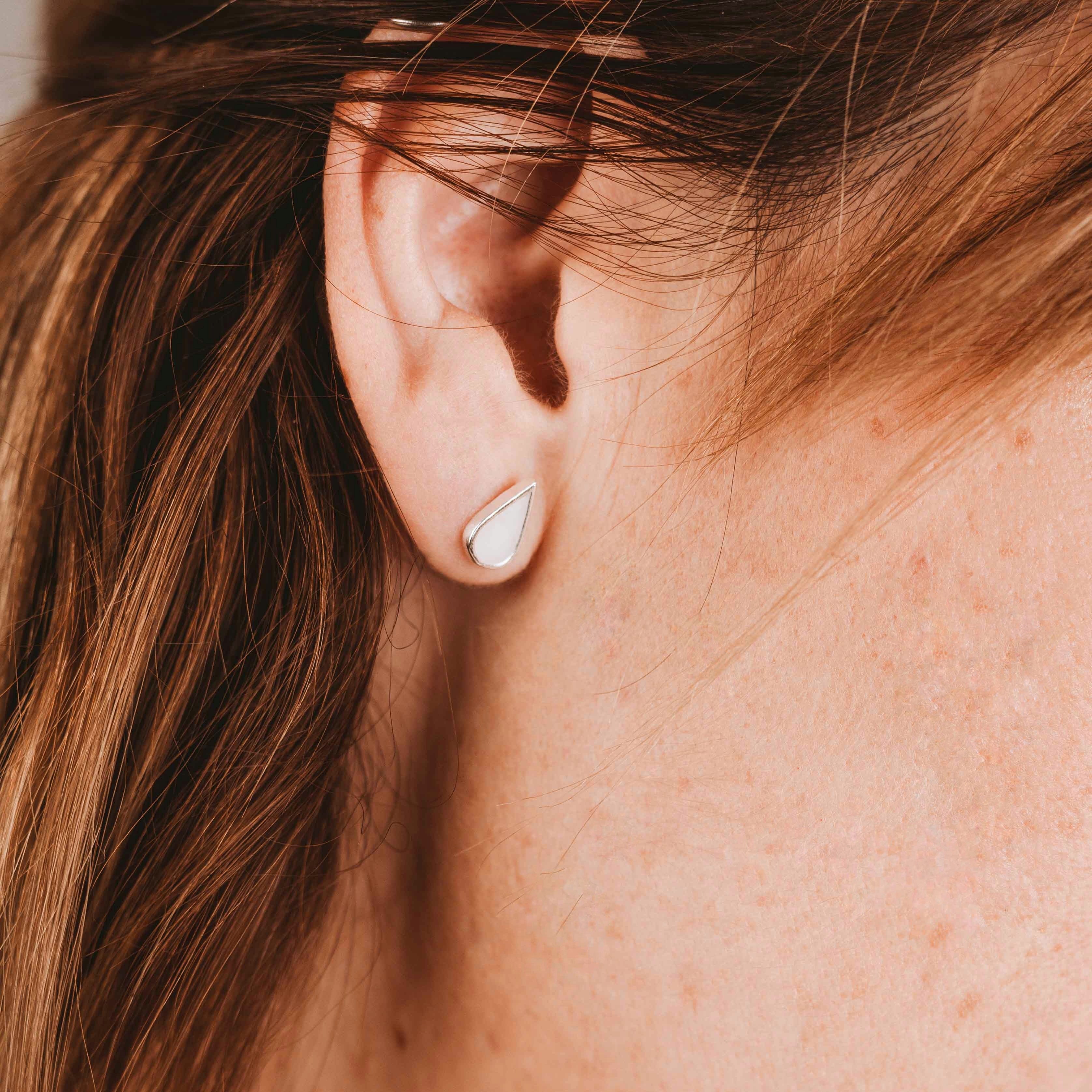 Pendientes gota de leche materna