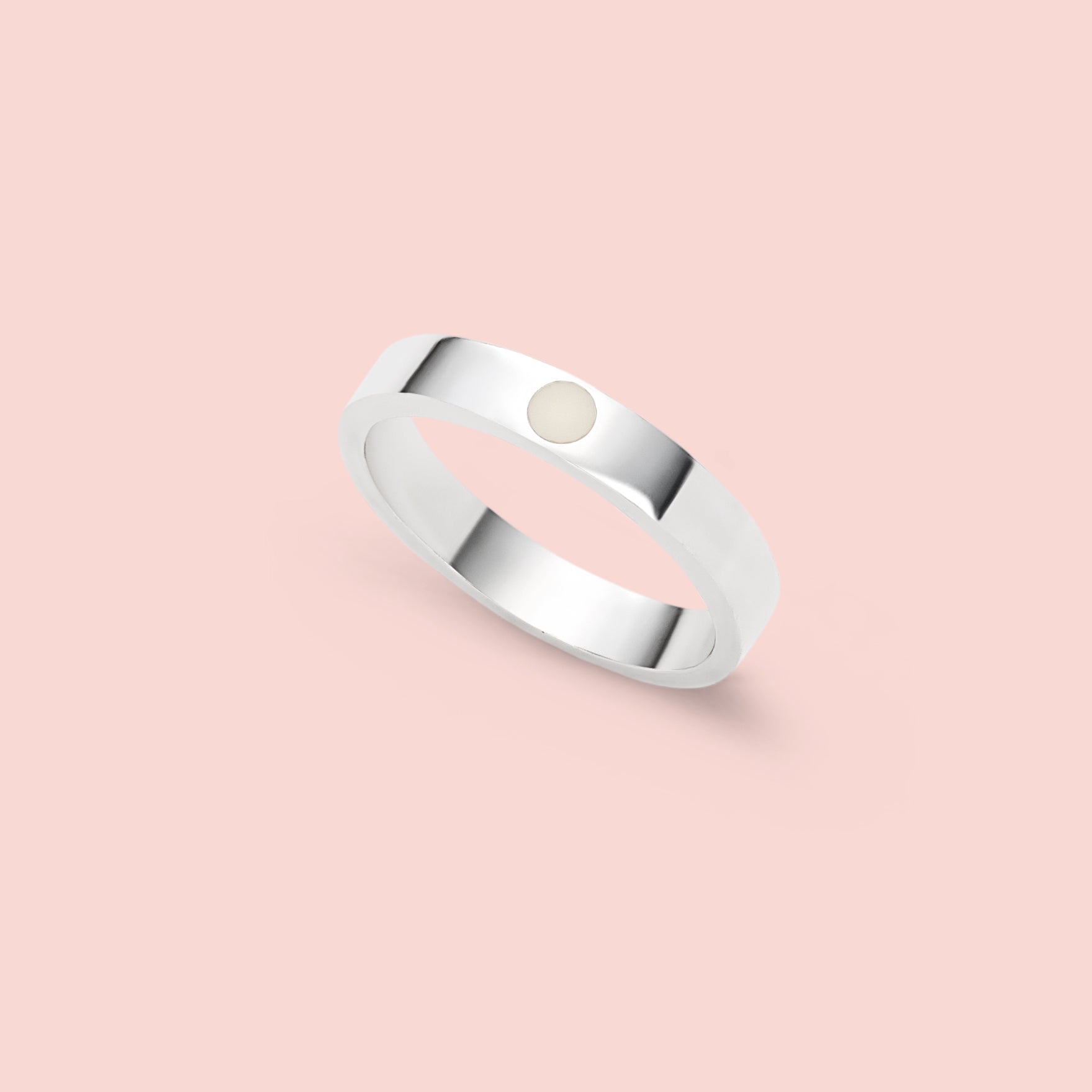 Anillo con círculo de leche materna