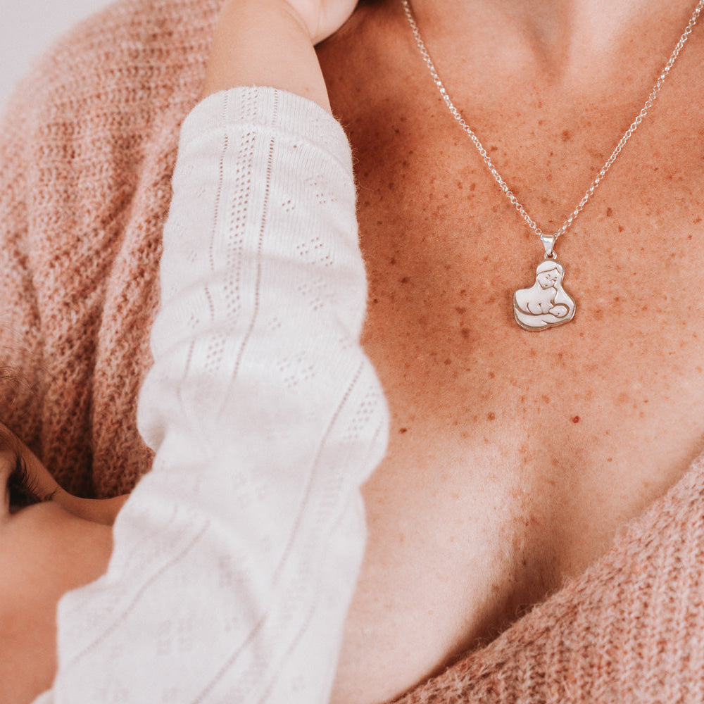 Colgante Mamá amamantando a bebé de leche materna