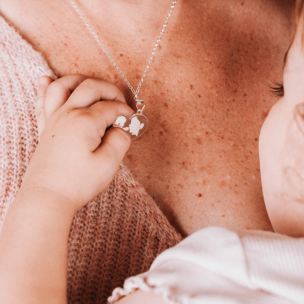 Colgante mamá con bebé de leche materna