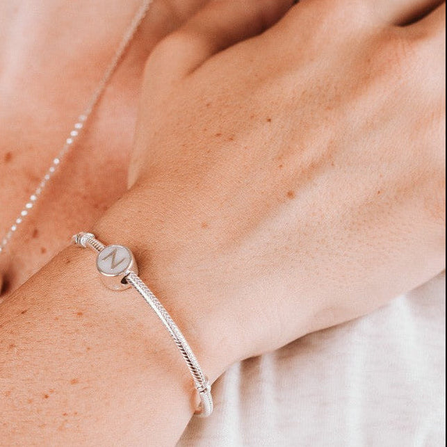 Charm para pulsera o colgante inicial de leche materna