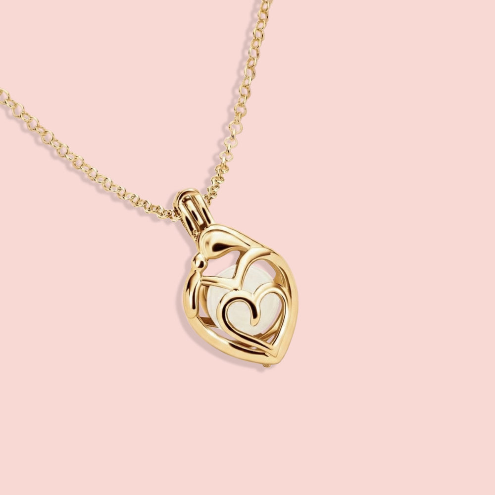 Colgante guarda-tesoro mamá y bebé con perla de leche materna en ORO 18K